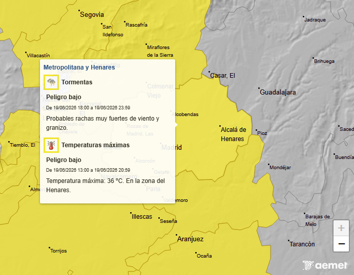 Cartel aviso amarillo por calor en Coslada con termómetro
