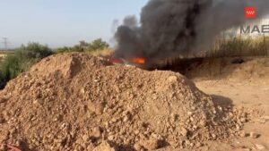 Vehículo en llamas en Mejorada del Campo durante incendio controlado